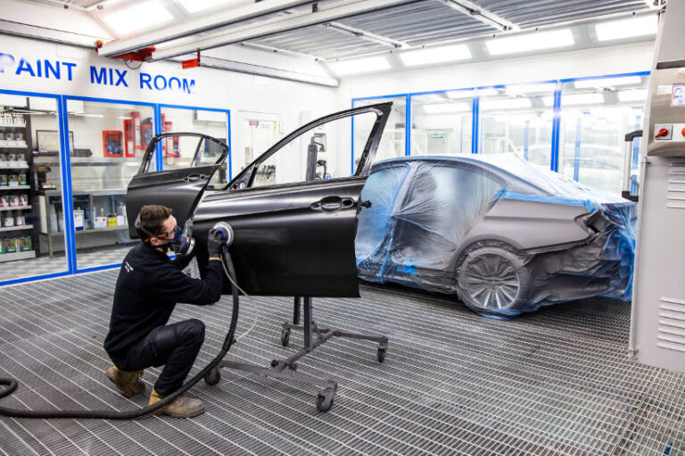 Are your repair networks ready for an electrifying fleet? BMW electric vehicle accident repair body shop door