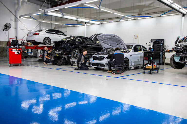 BMW electric vehicle accident repair body shop mechanic