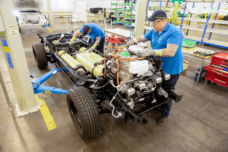 Factory Workers building hydrogen powered Toyota Hilux