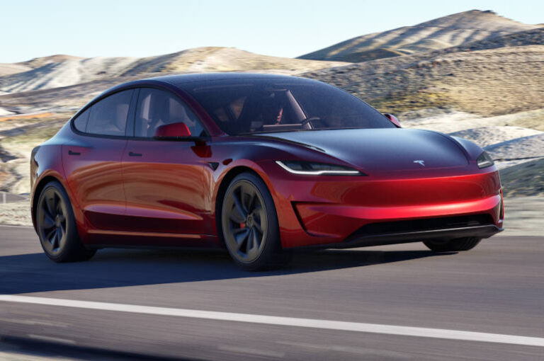 Tesla Model-3-Performance in read on a road