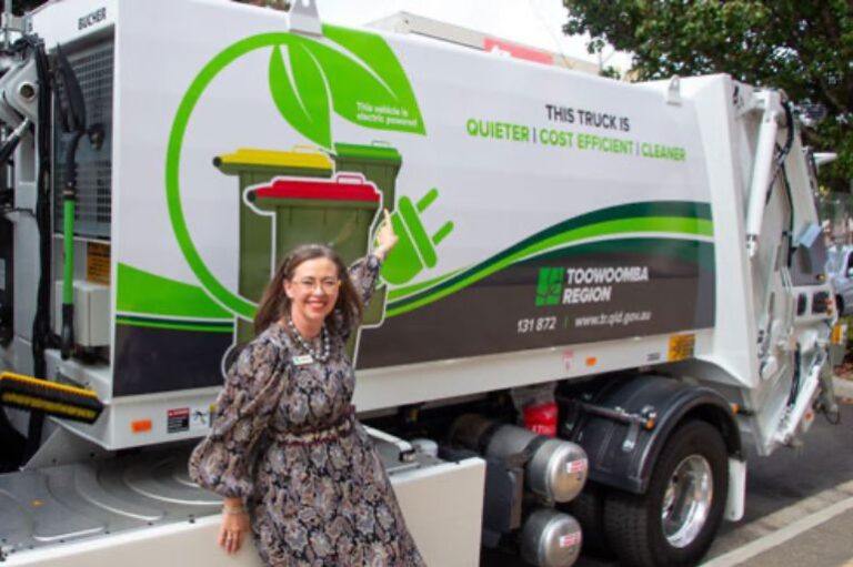 Cr Melissa Taylor Toowoomba Region Councillor with volvo electric waste truck