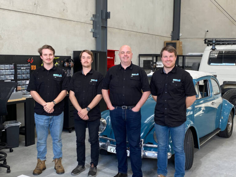 Edwin Higginson and team at Australian EVS at factory in Newcastle