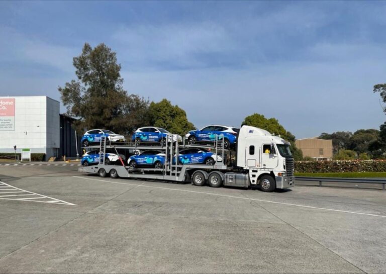 Sydney Water EV MG being delivered on truck