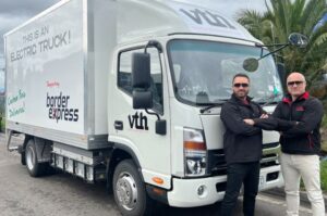 VTH owners in front of the electric truck