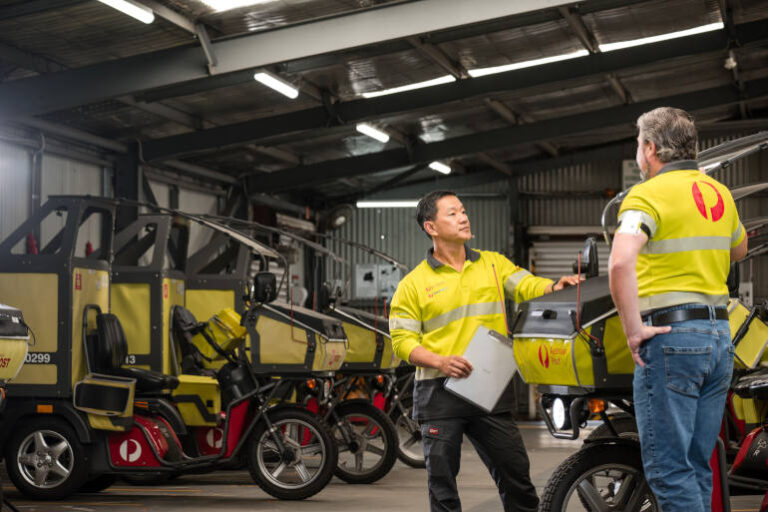 EV tricycles delivering mail