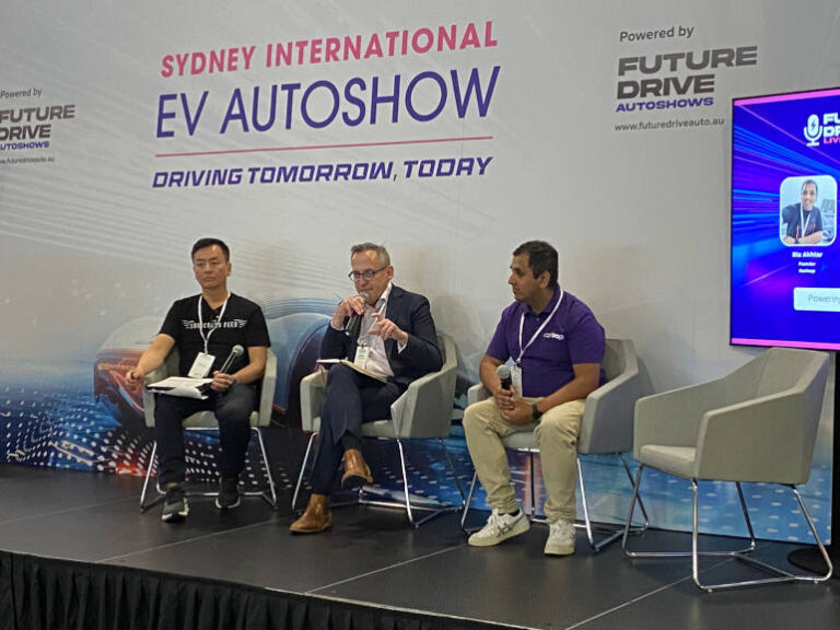 Speaker on stage at EV show